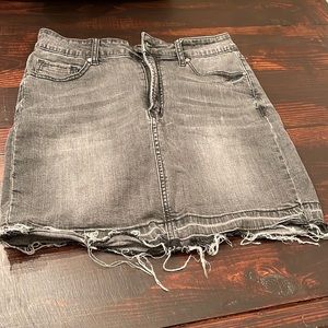 Distressed denim mini skirt